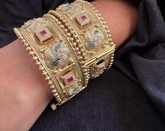 Square Ruby Bridal Kada - Heavily carved kada with ruby stones,  bead accents, and symmetrical floral swirl patterns in a grand bridal look.