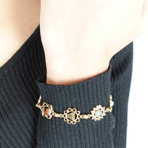 7 Chakras Sacred Geometry Bracelet - A spiritual charm bracelet with 7 gemstones—infused with balance and symbolism.