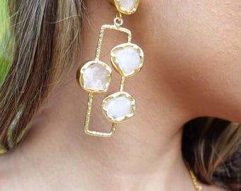 Handcrafted Long Rose Quartz Dangle Earrings with Raw Gemstones Set in Textured Gold-Plated Frames.
