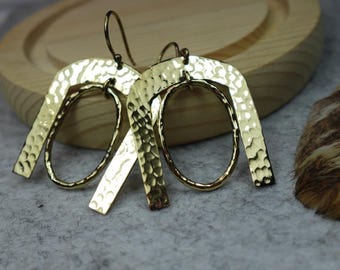Hammered Horseshoe Brass Earrings - Statement earrings with a bold arch and hammered finish in gold-tone brass.