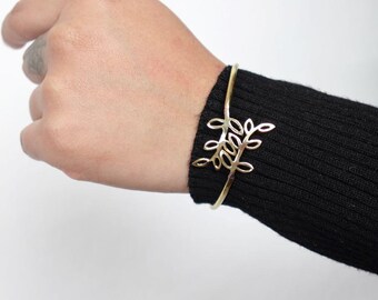 Leaf Motif Brass Adjustable Bracelet - Open cuff bracelet with a delicate leaf design—lightweight and nature-inspired.