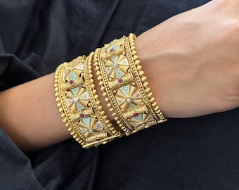 Royal Motif Bridal Kada with Enamel & Ruby Inlay - Vintage-style bangle with floral and geometric enamel patterns in a bold openable design.
