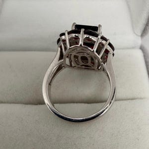 May include: A set of three ceramic mugs with a speckled, matte finish. Each mug is a different colour: light blue, cream, and grey. The mugs have a simple, modern design and a comfortable handle.