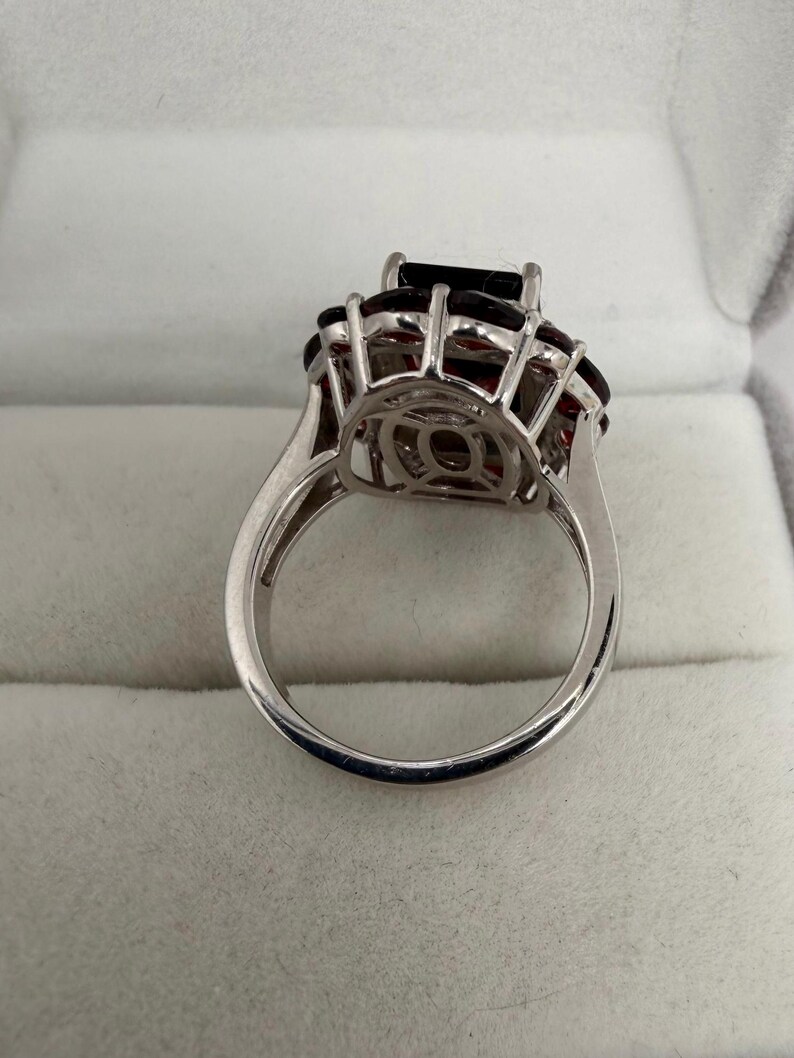 May include: A set of three ceramic mugs with a speckled, matte finish. Each mug is a different colour: light blue, cream, and grey. The mugs have a simple, modern design and a comfortable handle.