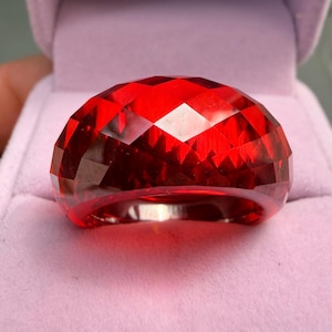 May include: A set of three ceramic mugs with a speckled, matte finish. The mugs are in shades of cream, light gray, and dark gray. Each mug has a simple, minimalist design, perfect for coffee or tea.