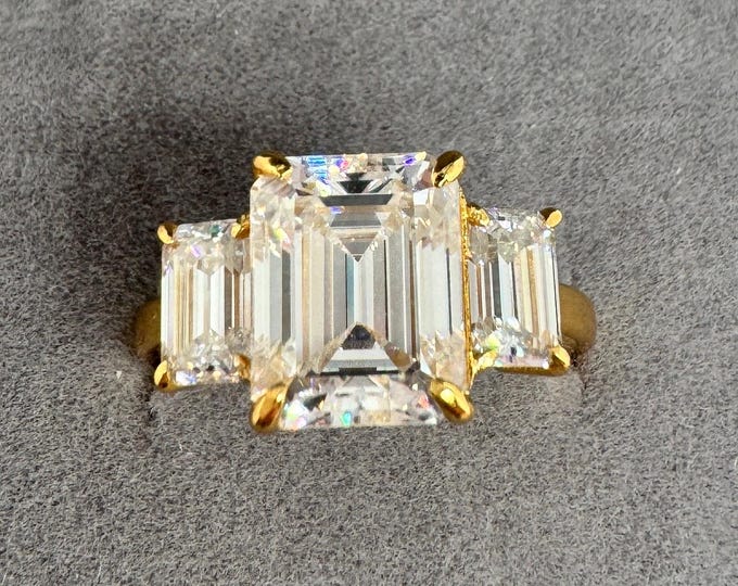 Emerald Cut Moissanite 3-Stone Ring: 14K Yellow Gold Anniversary Ring