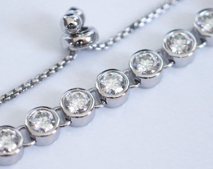 6.0mm Round Cut Moissanite Tennis Bracelet: Sterling Silver Bezel Set, Adjustable Chain
