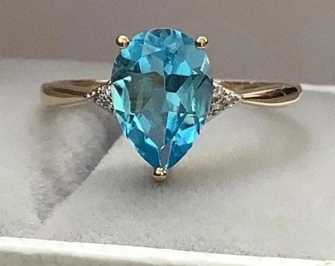 Pear cut Aquamarine diamonds 3-stone ring in 14k yellow gold au585
