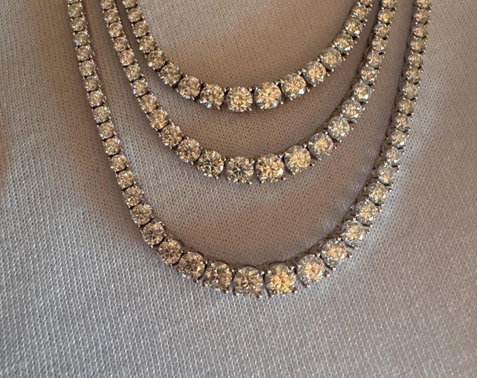 Moissanite Graduated Tennis Necklace: 12CTW Sterling Silver Riviera