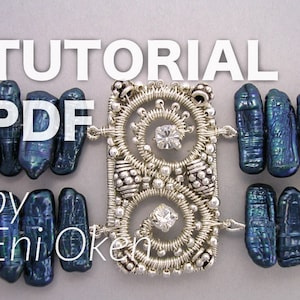 May include: A silver wire wrapped jewelry tutorial PDF by Enioken featuring a silver wire wrapped pendant with two clear rhinestones and a row of dark blue iridescent pearls.