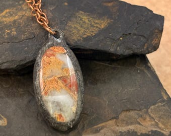 Agate 2 sided pendant with metal sides on copper chain