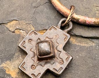Copper Cross pendant on small  browns and tan beaded necklace