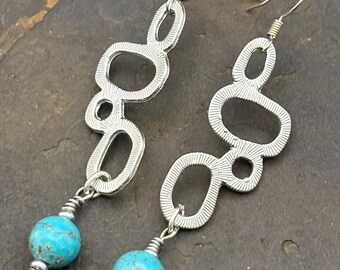 70's style silver tone dangle earrings with blue jasper