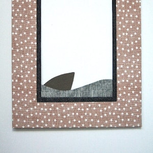 Brown star fabric wrapped matboard