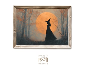 May include: Framed art print featuring a silhouette of a witch in a long dress and hat, set against a large orange sun. The background includes trees and a misty forest, with the text "MIRACLE MILE PRINTS" at the bottom.