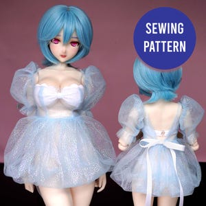May include: A doll wearing a light blue dress with a white bodice and a bow. The dress has a sparkly tulle skirt and puffy sleeves. The doll has blue hair and pink eyes. A blue circle with the words "SEWING PATTERN" is in the background.