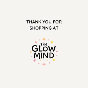 May include: A cream-colored background with the text "THANK YOU FOR SHOPPING AT" in black. Below, a logo reads "The GLOW MIND" in black, surrounded by a circle of pink, yellow, and orange stars.