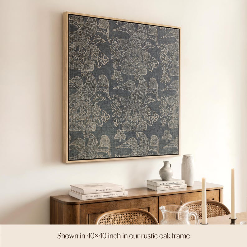 May include: A framed artwork featuring a repeating pattern of birds and floral elements in shades of blue and cream. The artwork is displayed in a rustic oak frame, measuring 40 x 40 inches.