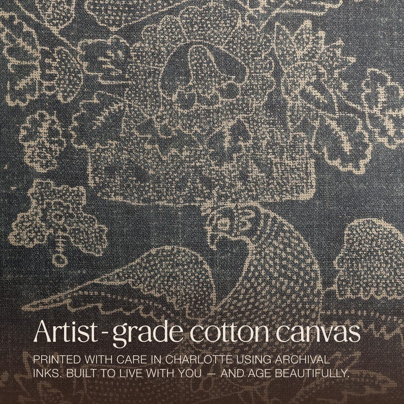 May include: Dark blue artist-grade cotton canvas with a beige floral and bird pattern. The text "Artist-grade cotton canvas" is displayed in white, along with additional text about the printing process.