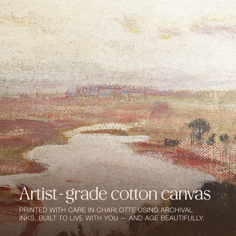 May include: A cotton canvas print with a landscape scene. The artwork features a river or stream in the foreground, with beige, brown, and red hues. The text "Artist-grade cotton canvas" is displayed at the bottom of the image.