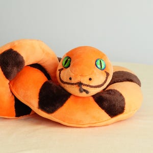 Handmade Plush Snake – Orange & Brown with Hypnotic Green Eyes | Murtazoo