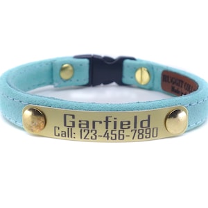 This is a personalized all suede and lined in suede cat collar. Custom made for cats as well as kittens. Non adjustable so follow measuring advise. Engraved lightweght aluminum plate displays your info in crisp easy to read, for a safe return.