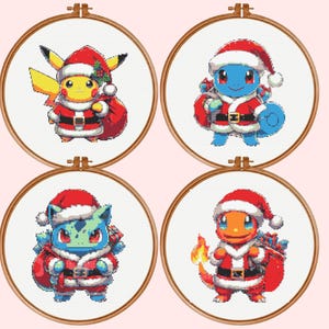May include: Four circular wooden embroidery hoops containing cross-stitch patterns of four different creatures dressed in red and white Santa Claus outfits. Each character carries a red sack filled with gifts, set against a white fabric background.