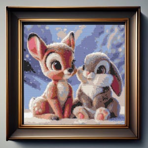 May include: A framed pixel art style illustration featuring a brown fawn and a grey rabbit sitting side by side in a snowy landscape. The artwork is enclosed in a dark brown frame with gold inner detailing, showcasing a winter scene.