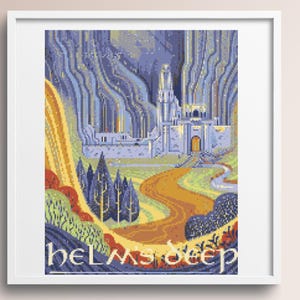 May include: A framed cross-stitch pattern depicting a fortress nestled against tall, blue-toned mountains. A winding orange path leads to the stone structure, surrounded by stylized trees and greenery. The text "helm's deep" is printed at the bottom.