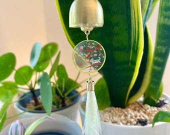 Little dog and blossom tree peace and safety charm with bell