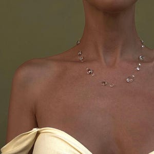 Handgjort dagghalsband "daggdroppehalsband". Från Bali. Present till henne.