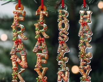 May include: Christmas ornaments spelling out "FRANK" and "ROSAN" and "HARLEY" in gingerbread-style letters. Each letter is decorated with icing, holly, and candy canes, and hangs from a red ribbon.