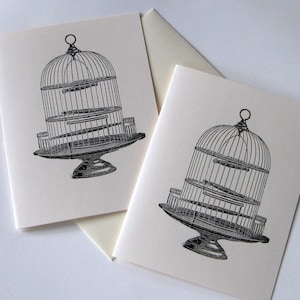 Bird Cage Folded Note Card Set van 10 in wit of ivoor met bijpassende enveloppen