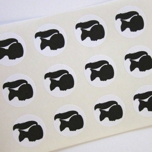 May include: Sheet of 12 white round stickers with black silhouette images of a girl with a ponytail. The girl is facing to the right.