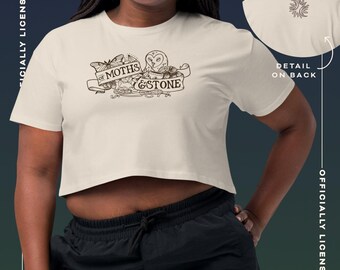 Of Moths and Stone banner Women’s crop top | Officially Licensed K.R.Fryatt Merch
