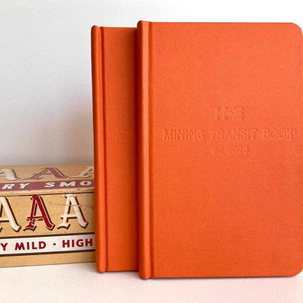 Set of 2 unused 1960s K&E Mining Transit books, bright orange small hardbound notebooks in mint condition