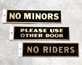 No Minors, No Riders or Please Use Other Door vintage peel-and-stick door signs in lightweight metal