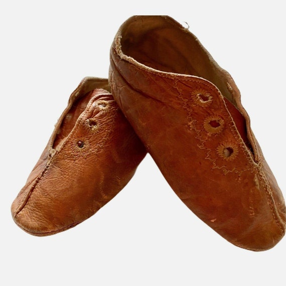 baby shoes with holes