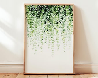 May include: A framed art print featuring a watercolor illustration of cascading green leaves. The leaves vary in shades of green, creating a natural and organic aesthetic. The artwork is set against a white background, and framed in a light wood frame.