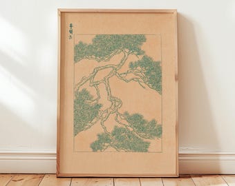May include: Framed art print depicting a detailed illustration of a pine tree branch with green foliage against a beige background. The artwork is in a wooden frame and leans against a white wall and wooden floor.