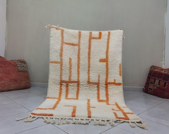 Alfombra marroquí de lana naranja hecha a mano: estilo bohemio para sala de estar.