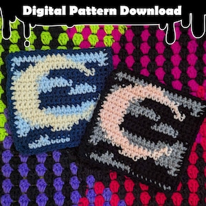 May include: Two crochet squares with a crescent moon design. The squares are made with different colored yarn, including blue, white, pink, black, and gray. The squares are on a background of colorful crochet squares.