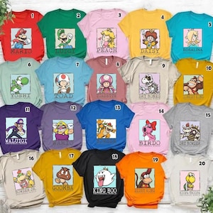 May include: A collection of twenty short-sleeved t-shirts in various colors, each featuring a square graphic print of a Super Mario character with their name printed below, numbered one through twenty in the top right corner of each shirt.