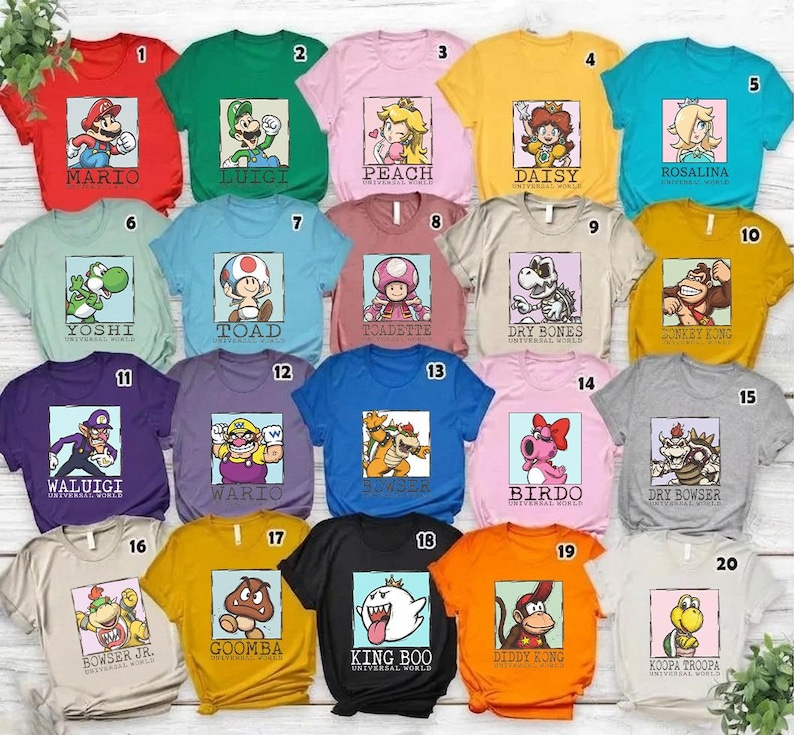May include: A collection of twenty short-sleeved t-shirts in various colors, each featuring a square graphic print of a Super Mario character with their name printed below, numbered one through twenty in the top right corner of each shirt.
