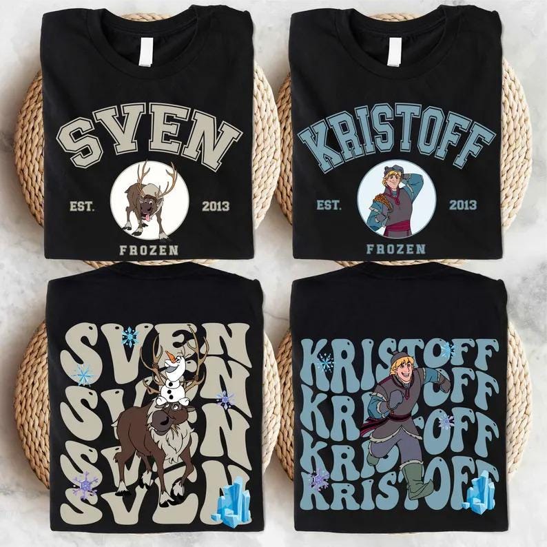 May include: Four black t-shirts with "Frozen" character designs. Two shirts feature "Sven" with a reindeer graphic, and the other two feature "Kristoff." Each design includes the text "EST. 2013."