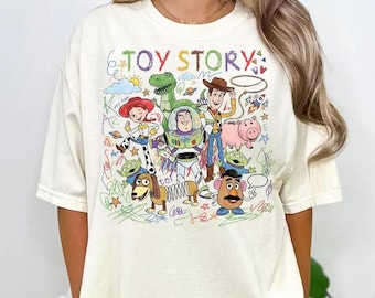 Disney Toy Story Kids Comfort Colors Shirt , Childlike Drawing Woody Buzz Tee, You've Got a Friend in Me Pixar Top, Family Trip 2026 Shirt