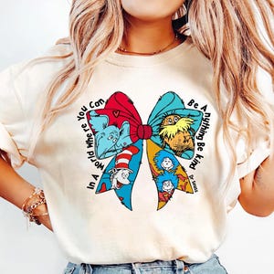 Dr. Seuss Shirt, Dr Seuss Sweatshirt, Coquette Bow Dr Seuss Day Shirt, Cat In The Hat Shirt, Teacher shirt, Kids Shirt, Reading Day Shirt
