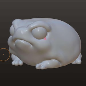 May include: A white, 3D-printed model of a frog with a grumpy expression. The frog has large, round eyes and a wide mouth.