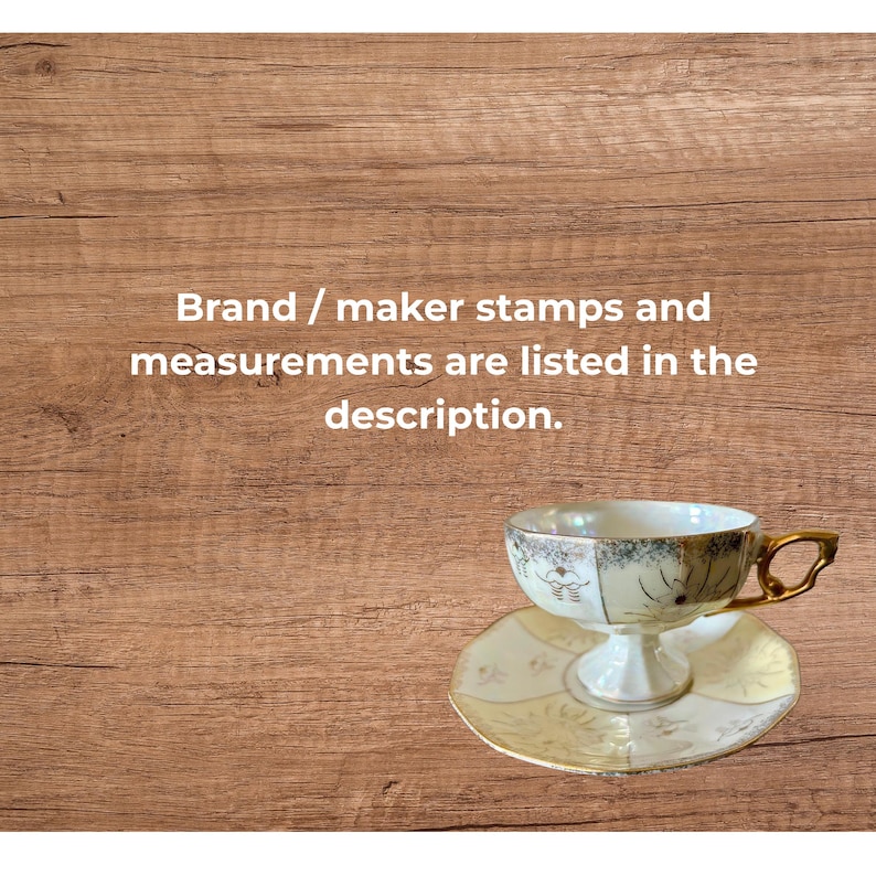 May include: A vintage teacup and saucer set. The teacup is white with gold trim and floral accents. The saucer is a matching design. The set is on a wooden surface. Text in the image reads: Brand / maker stamps and measurements are listed in the description.
