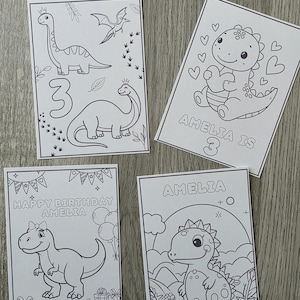 May include: Four black and white dinosaur-themed coloring pages. One page has the number 3 and two dinosaurs. Another says "AMELIA IS 3" with a dinosaur and hearts. A third says "HAPPY BIRTHDAY AMELIA" with a dinosaur and balloons. The last page says "AMELIA" with a dinosaur.